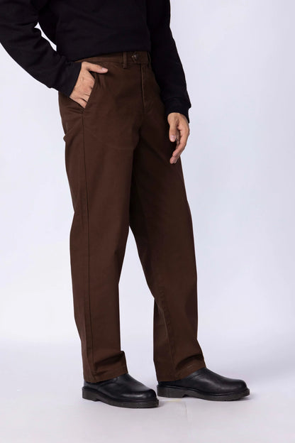 Men's brown chinos, side view with slanted front pockets