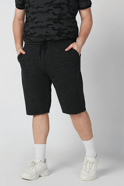 Black heather knit shorts with drawstring and side pockets