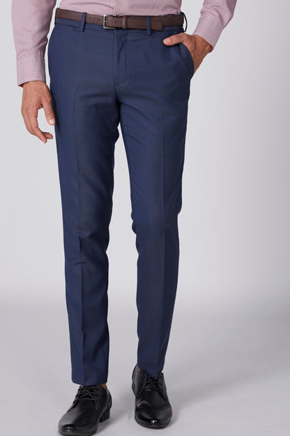 Men's blue dress pants with belt loops, flat front, and button closure