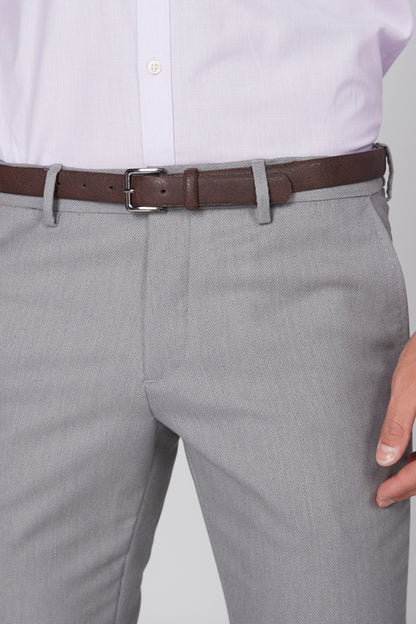 Grey trousers with brown leather-look belt and metal buckle, belt loops