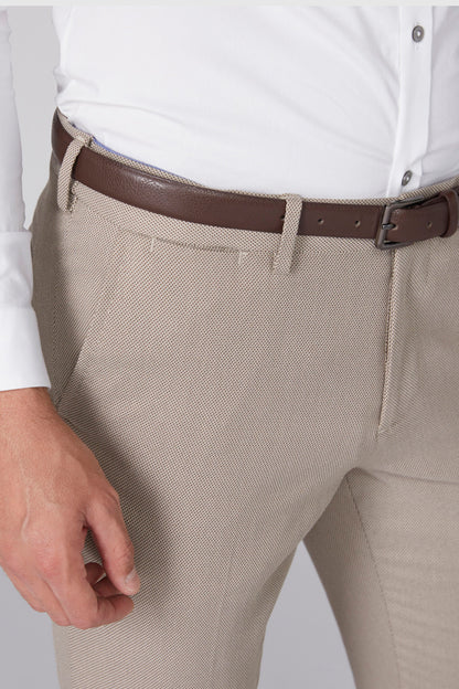 Beige textured pants with dark brown belt, stitched waistband detail