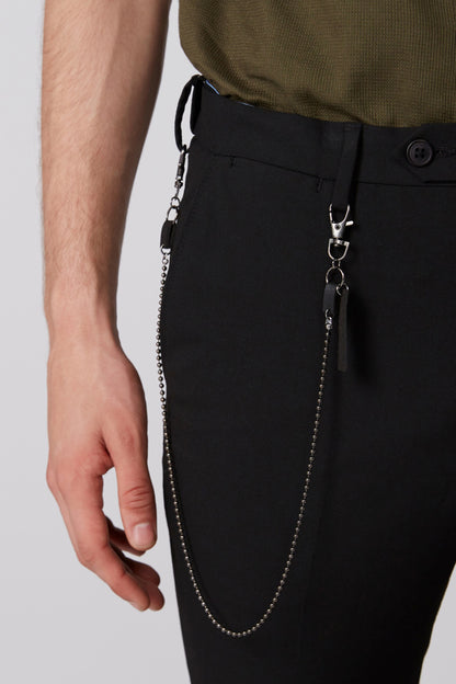 Splash black pants close-up of chain strap on side pocket with metal clips