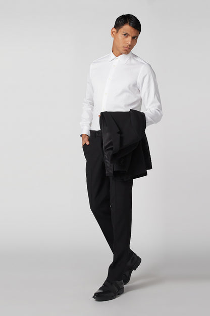 White button-up dress shirt with long sleeves, collar, and gold-tone buttons