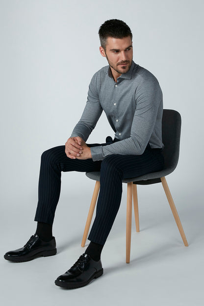 Men's grey long-sleeve button-up shirt with collar and white buttons