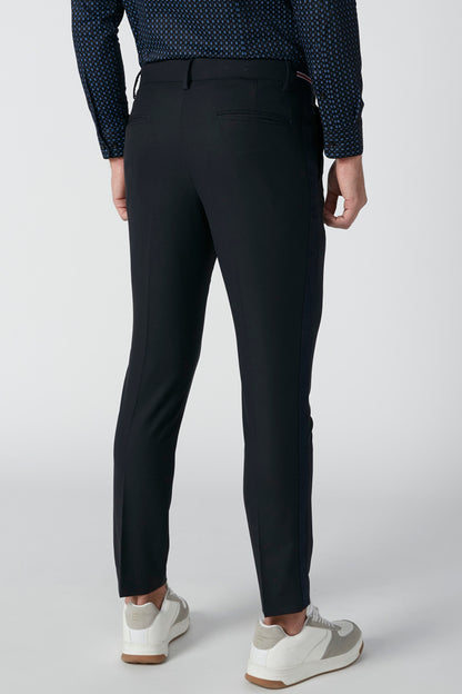 Black slim trousers with belt loops and zip fly