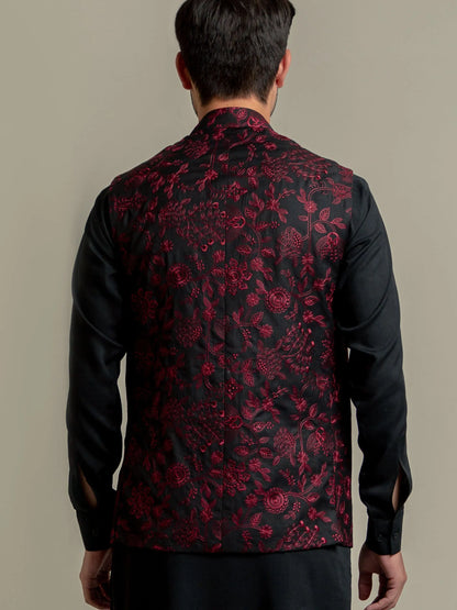 Men's burgundy floral print shirt with black sleeves, back view