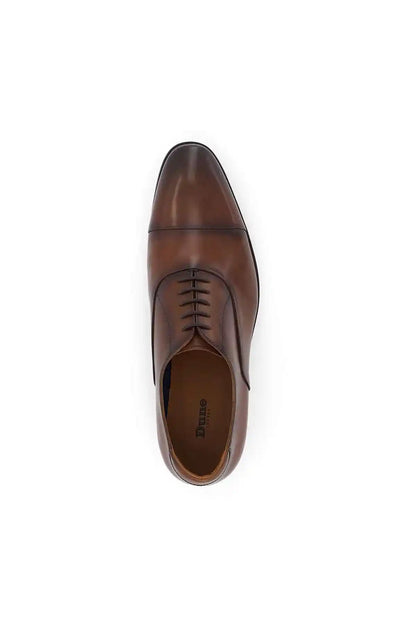 Dark tan lace-up oxford shoe top view showing eyelets and stitching