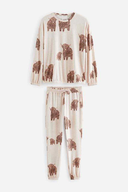 Oatmeal printed pajama set flat lay: long-sleeve top and matching jogger pants