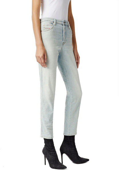 Light blue straight-leg jeans with back yoke and stitched seams, side view.