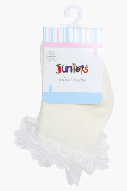 Off-white infant socks with ruffled lace cuffs, on hanging pack label