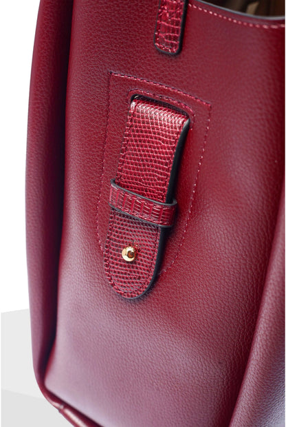 Berry leather bag with textured inset pocket detail and decorative stitching