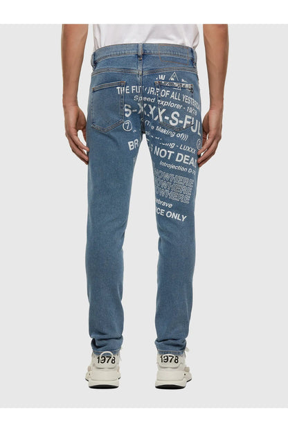 Blue denim jeans front view with central printed text and white logo details.