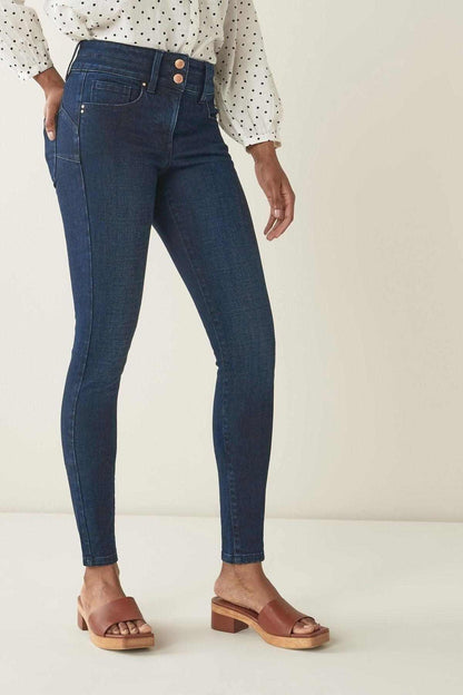 Inky denim slim jeans with belt loops, button front, and five-pocket styling