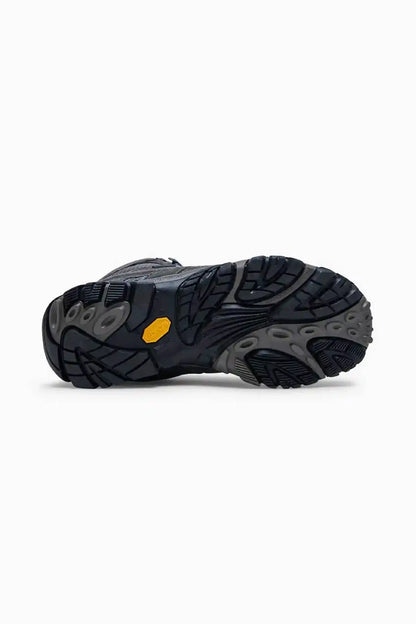 Merrell granite hiking shoe outsole tread, dark rubber with yellow accent