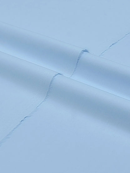 Brumano blue viscose fabric closeup with stitched seam line