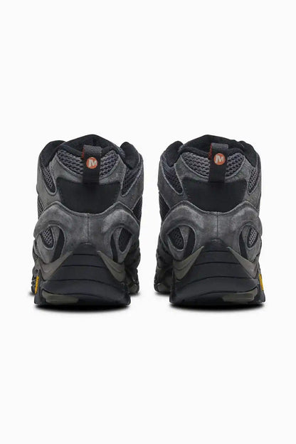 Dark hiking shoe pair shown from heel, padded collar and heel tabs