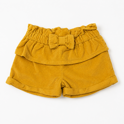 Yellow baby shorts with elastic waistband and bow, pleated ruffle overlay