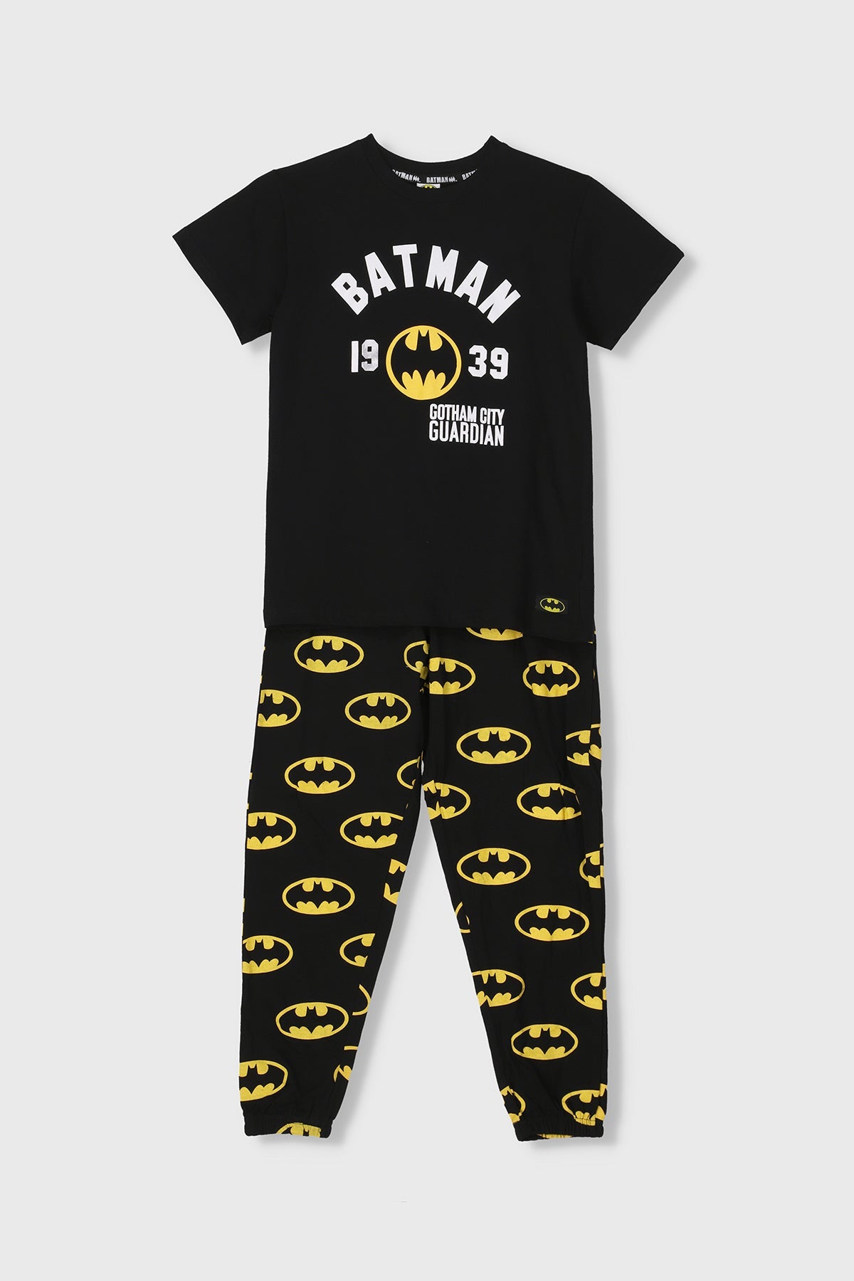 Batman pajama set: black short-sleeve tee with chest print and matching lounge pants.