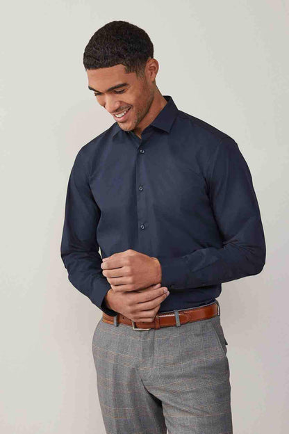 Men's navy button-up dress shirt, long sleeves, pointed collar.