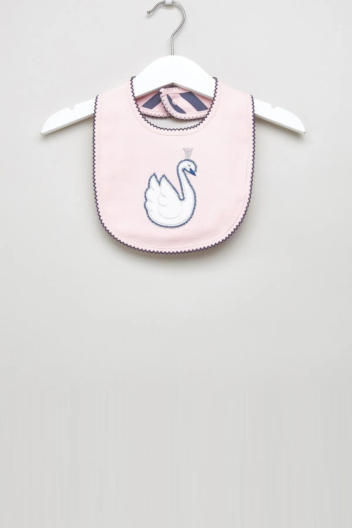 Baby bib, pink with blue swan applique and scalloped edge