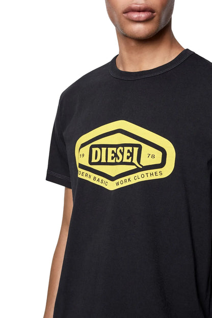 Black Diesel crew-neck T-shirt with yellow oval logo print at chest