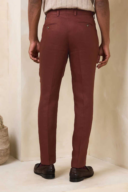 Men's brown suit trousers with button fly, belt loops, and straight legs