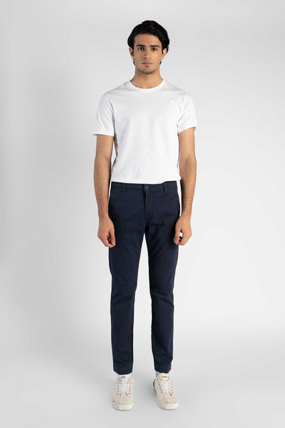 Blue jeans front view with belt loops, button closure, and cuffed hem