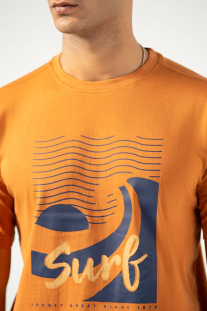 Caramel orange T-shirt with blue and yellow surf wave graphic, crew neck
