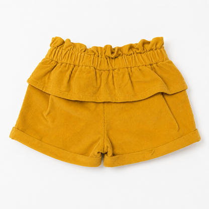Yellow baby shorts with gathered elastic waist and layered ruffle skirt, bow front