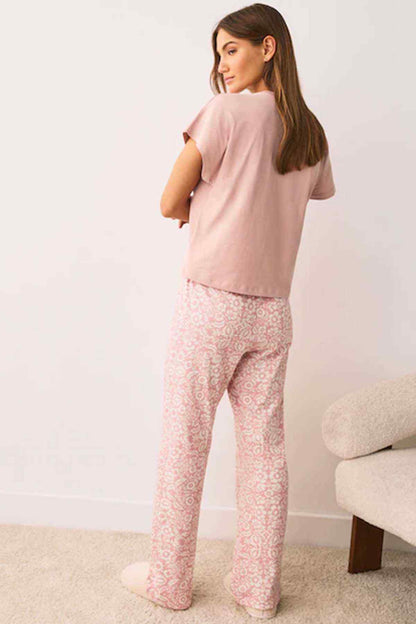 Pink short-sleeve T-shirt with pink patterned wide-leg lounge pants