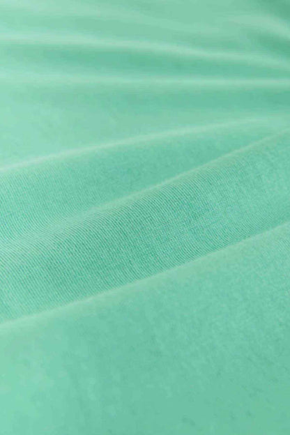 Mint green knit fabric texture