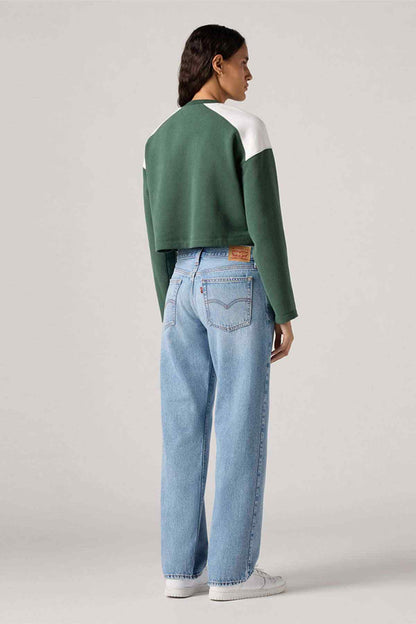 Levi's light blue denim jeans, back view with wide straight legs and back patch pocket