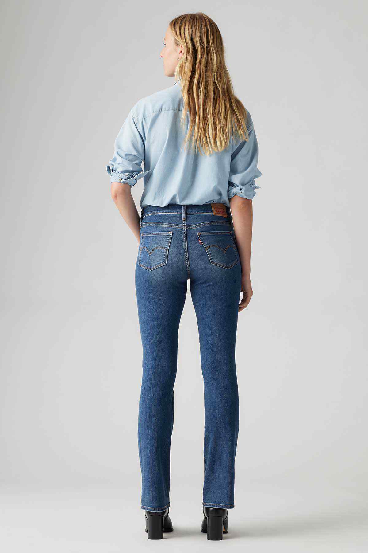 Levi's medium indigo jeans back view with yoke seam and rear patch pockets