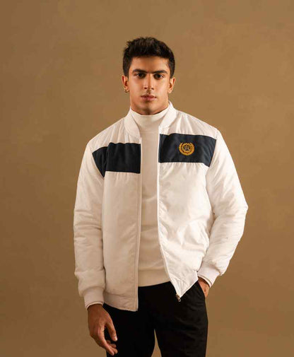 Men's white zip-up bomber jacket with black panels and logo patch, stand collar