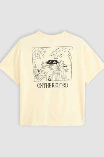 Light yellow crewneck T-shirt with 'ON THE RECORD' back graphic