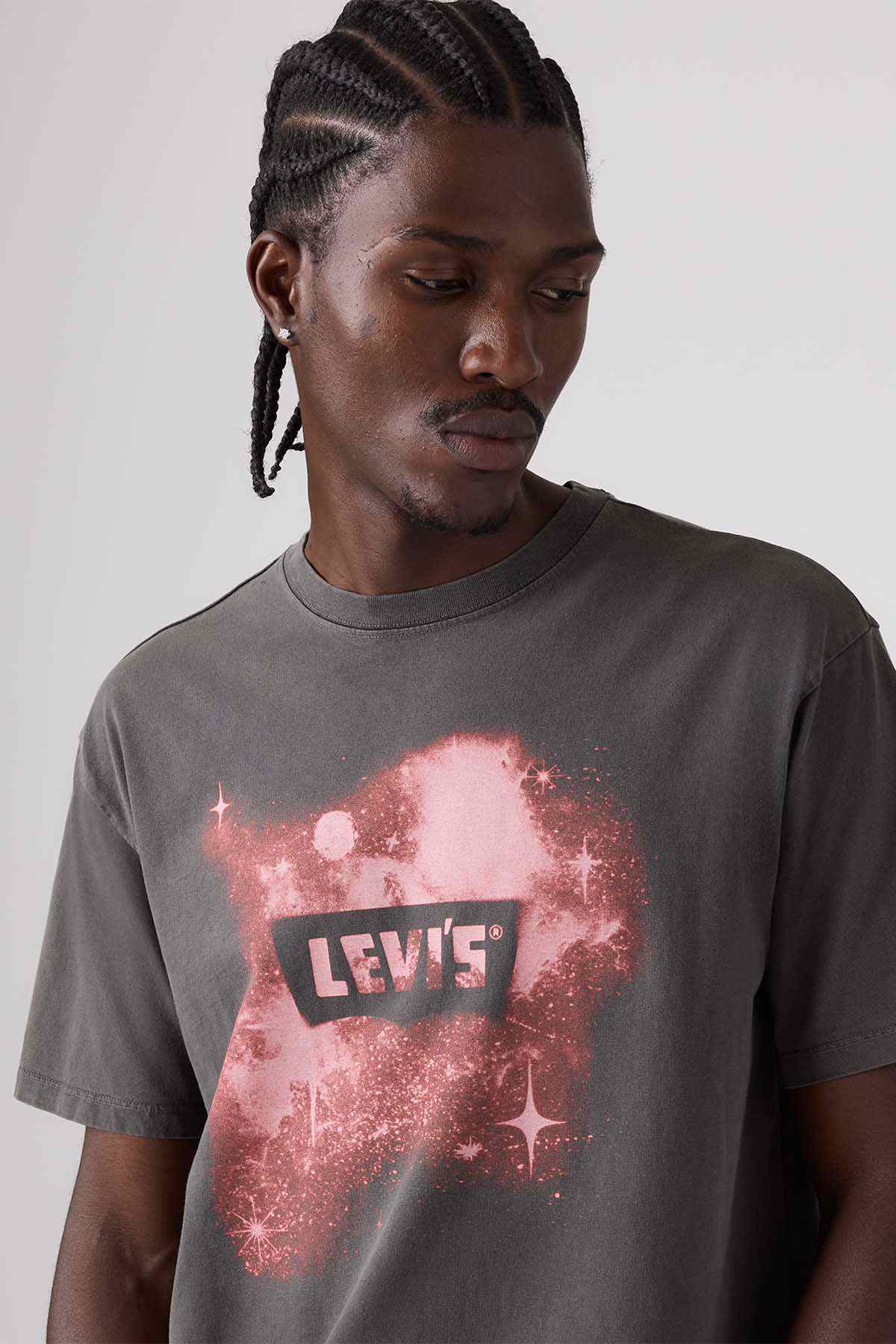 Grey T-shirt close-up of pink starburst square logo graphic