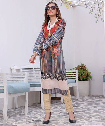 Long-sleeve striped tunic dress with floral details and lace-trim hem