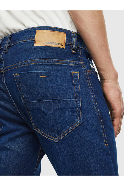 Blue denim jeans back view with leather patch and stitched rear pockets