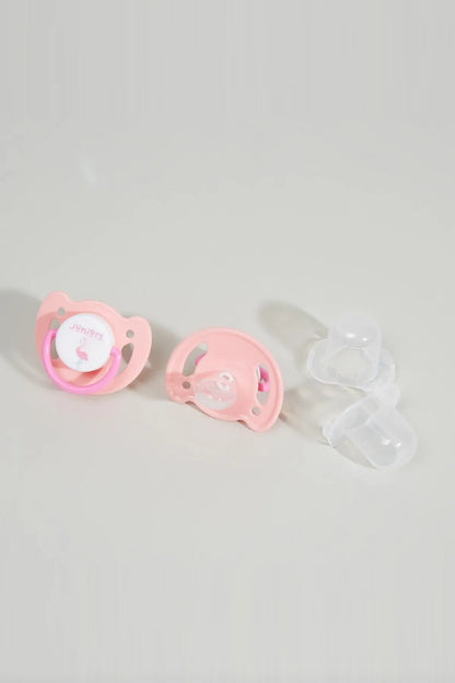 Three baby pacifiers: pink shields and one clear shield, orthodontic nipples
