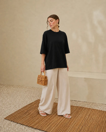 Black crew-neck short-sleeve t-shirt with relaxed fit and straight hem
