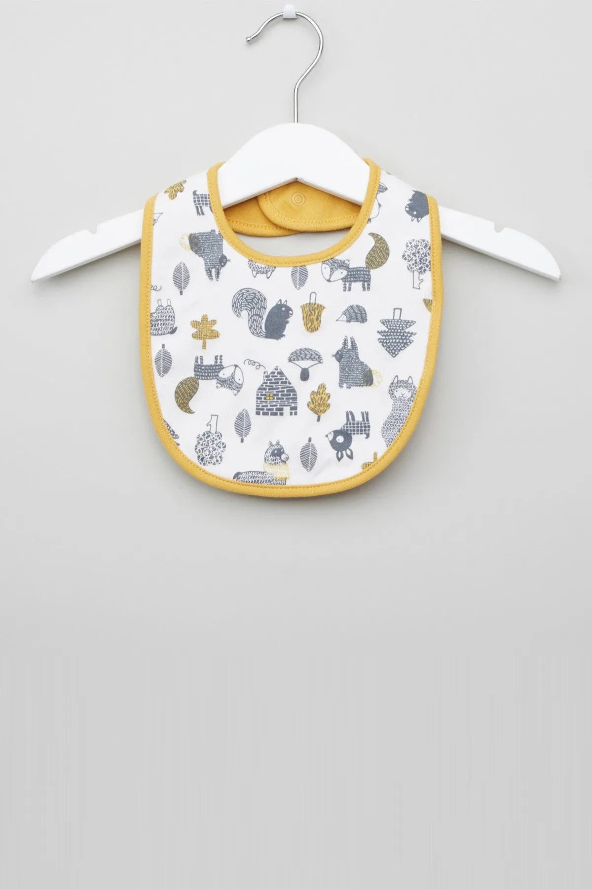 Baby bib with animal print, white fabric and yellow trim