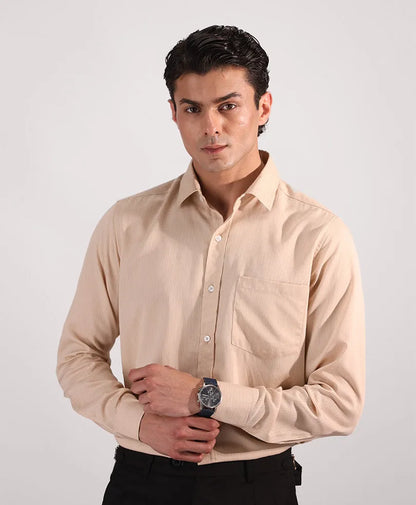 Beige fitted button-up dress shirt with long sleeves and chest pocket