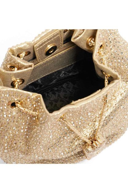 Gold sequin bucket bag open interior with snap hardware and dark lining