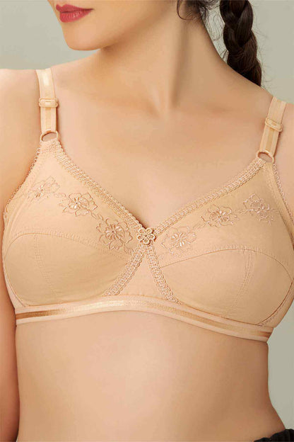 Nude lace-trim wireless bra with scalloped embroidery and adjustable straps
