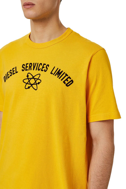 Yellow crew-neck T-shirt close-up showing “Diesel Services Limited” graphic