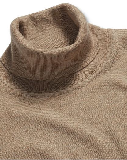 Neutral beige wool turtleneck sweater with ribbed high neck