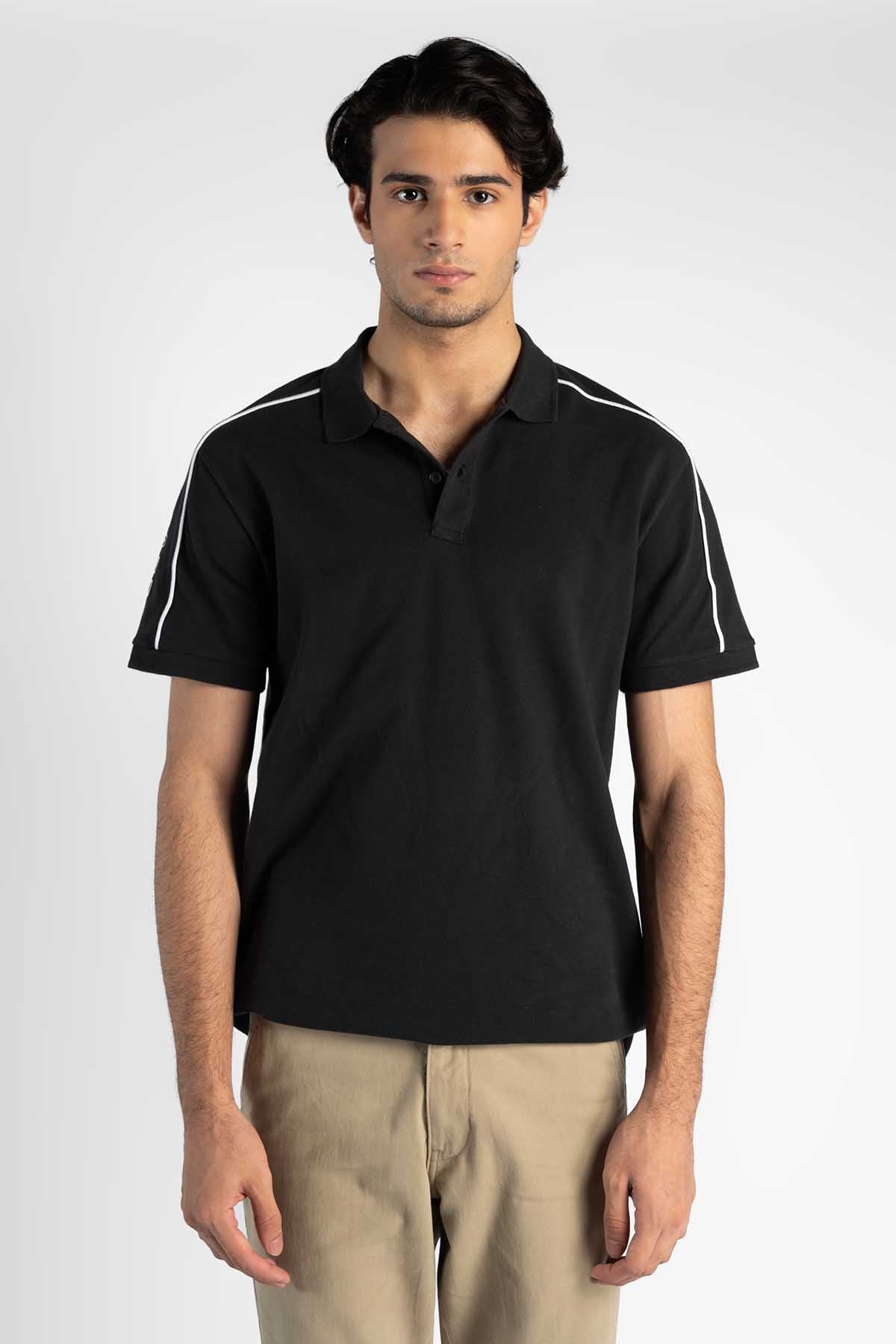 Levi's black polo shirt with white sleeve stripe accents