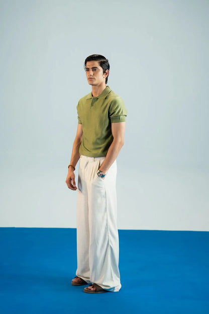 Olive short-sleeve polo shirt with pointed collar and textured knit fabric