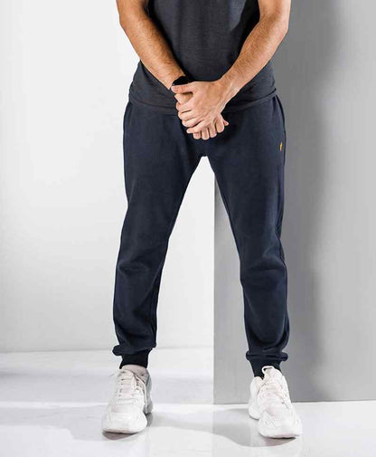 Fitted dark navy jogger pants, elastic waist and tapered ankle cuffs