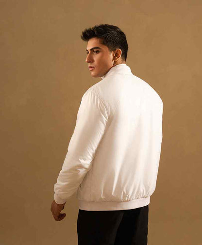 Men's white padded bomber jacket with stand collar, side view
